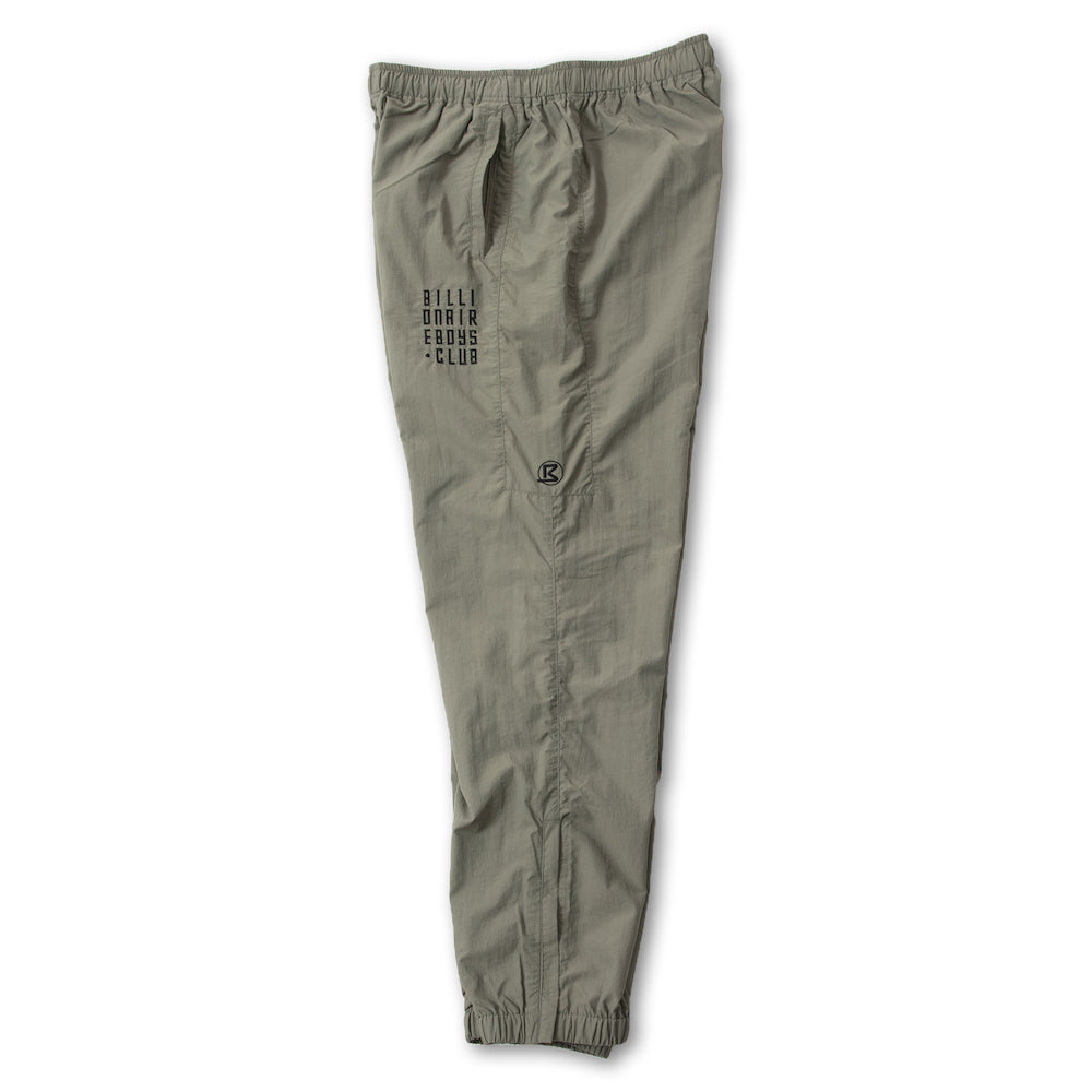 Load image into Gallery viewer, EMBROIDERED LOGO SWITCHING NYLON PANTS
